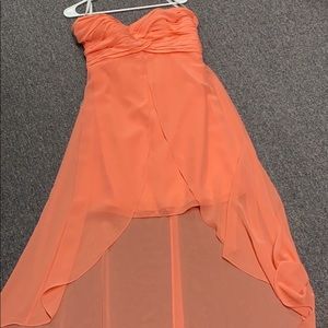 Bridesmaid/prom dress. Worn once, ruffled top, short in front, long in back